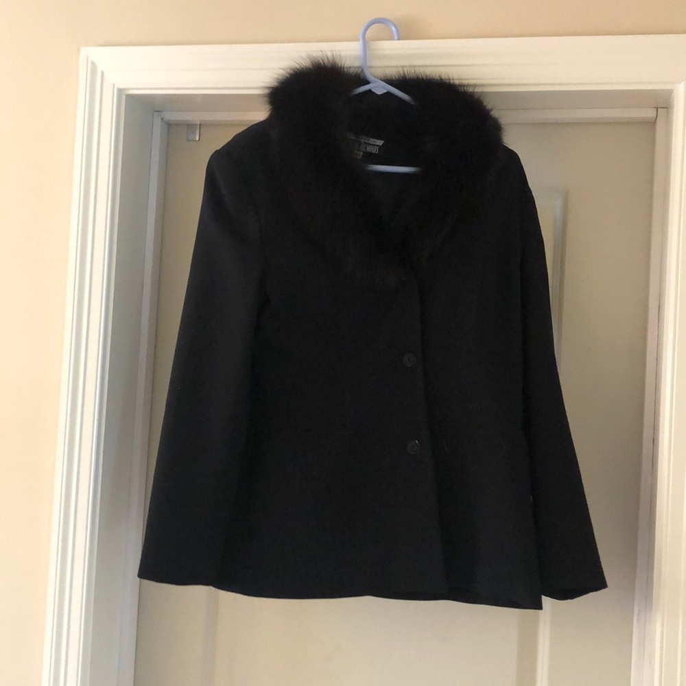 Black jacket with fur lining around Neck